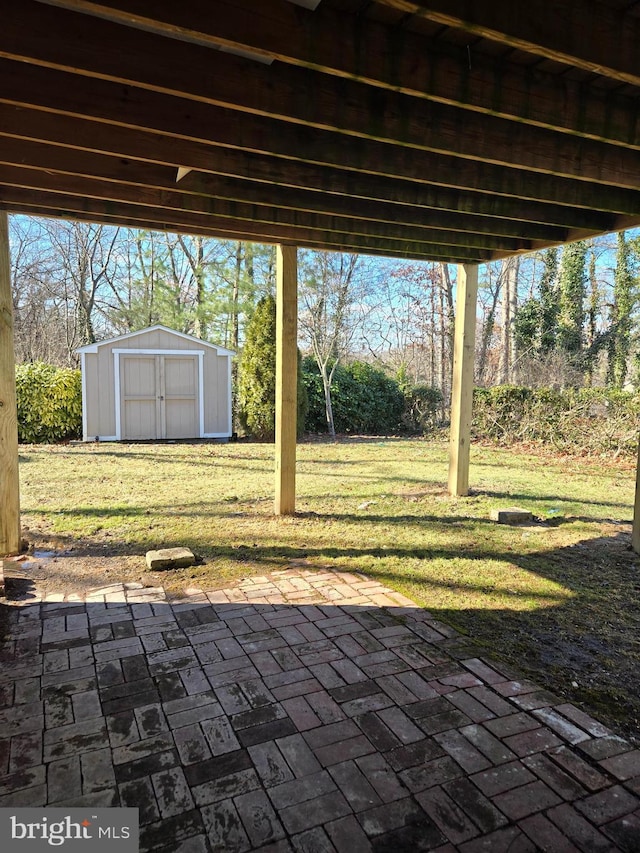 view of patio featuring a shed