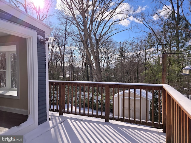 deck with a storage shed