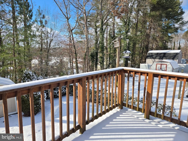 view of snow covered deck