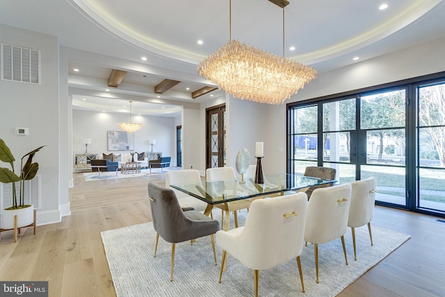 dining room with an inviting chandelier, recessed lighting, light wood-style floors, and a healthy amount of sunlight