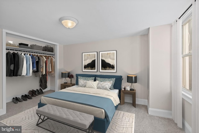 carpeted bedroom featuring a closet