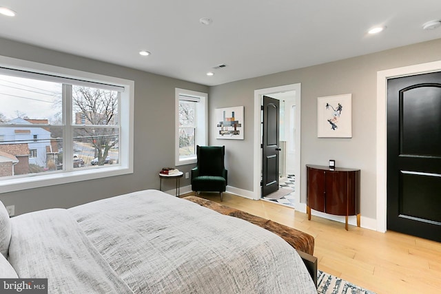 bedroom with wood-type flooring