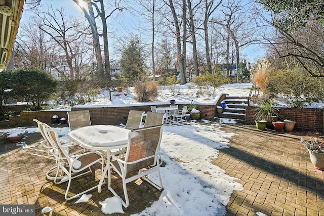 view of snow covered patio