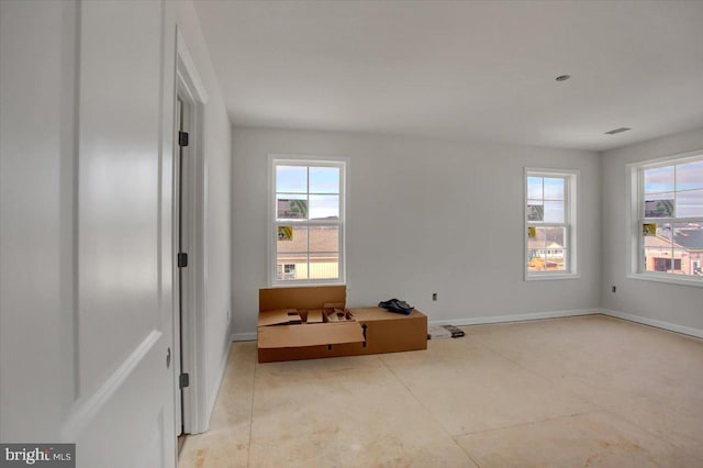 bedroom featuring multiple windows