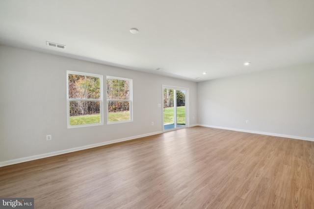 empty room featuring light hardwood / wood-style floors