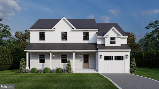 view of front of house with a garage, a front yard, and covered porch