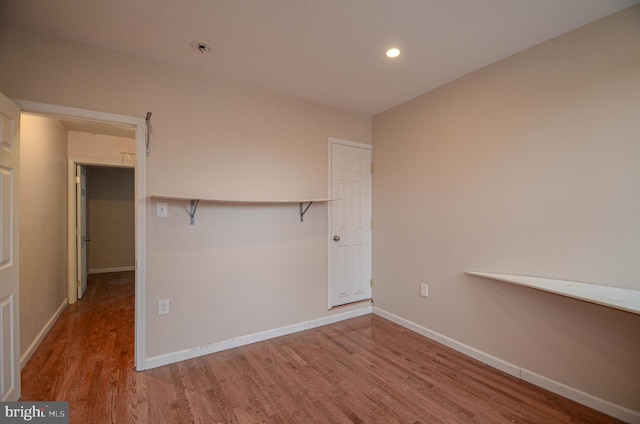 unfurnished room featuring light hardwood / wood-style floors