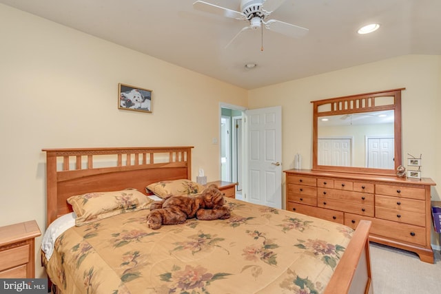 bedroom with ceiling fan and lofted ceiling