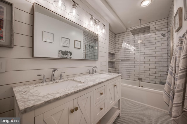 bathroom with tile patterned flooring, vanity, and shower / bath combo with shower curtain