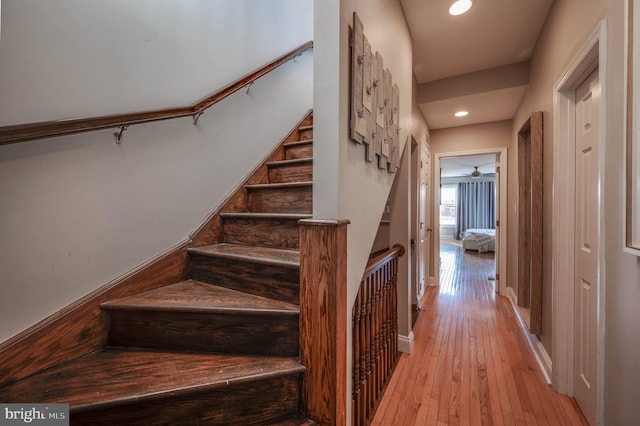 stairway featuring hardwood / wood-style flooring