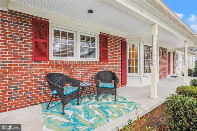 view of patio featuring a porch