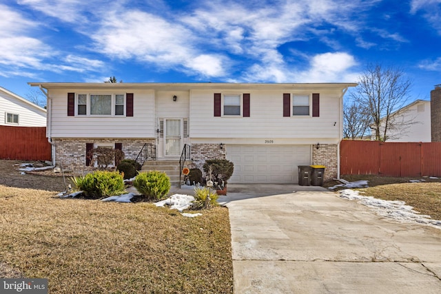 split foyer home featuring a garage