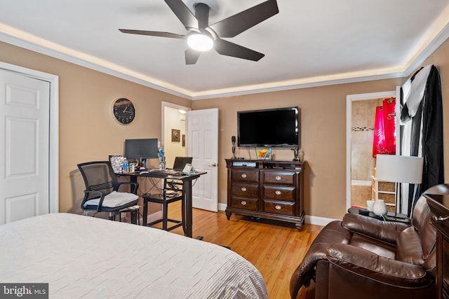 bedroom with crown molding, ceiling fan, and light wood-type flooring