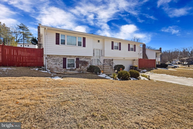 raised ranch with a garage