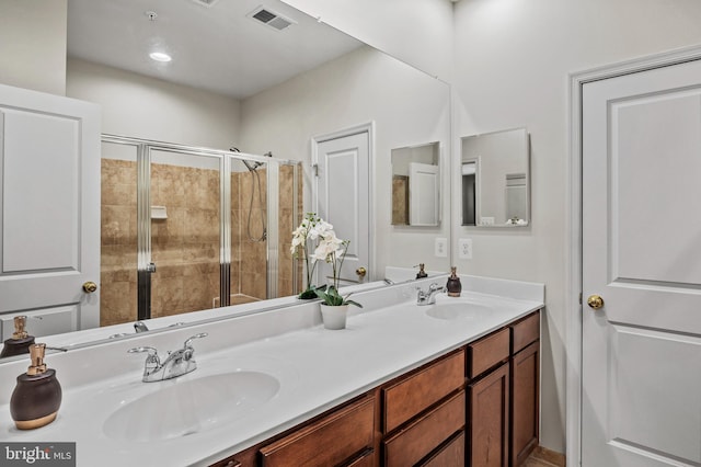 bathroom featuring vanity and walk in shower