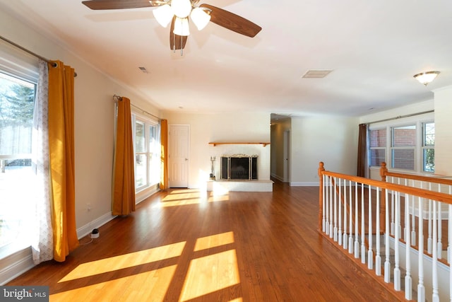 unfurnished living room with hardwood / wood-style flooring