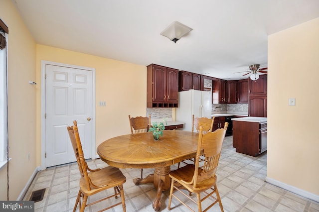 dining room with ceiling fan