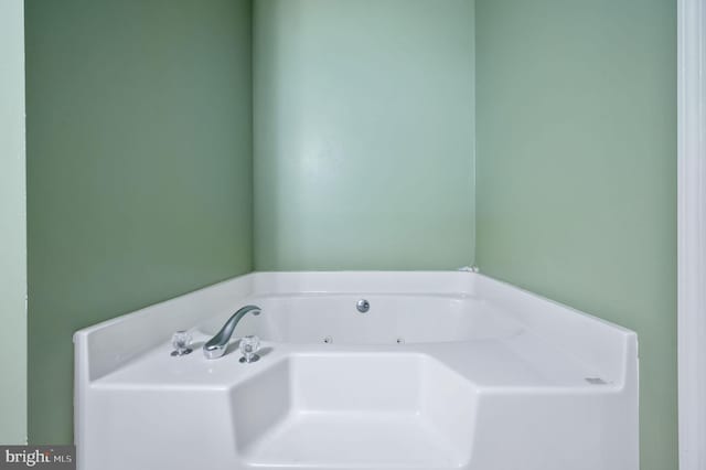 bathroom with a bathing tub