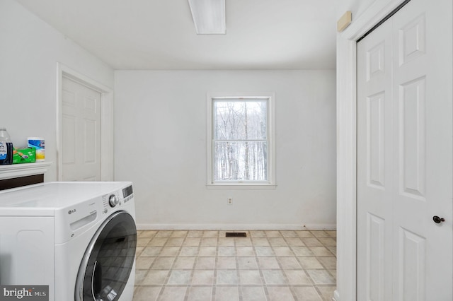 laundry room with independent washer and dryer