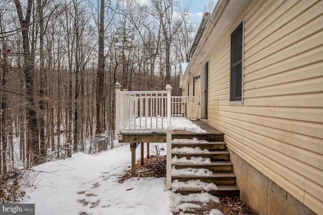 view of snow covered deck