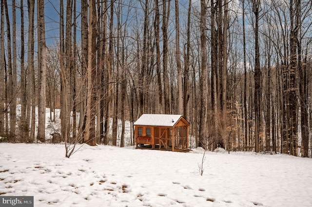 view of yard covered in snow