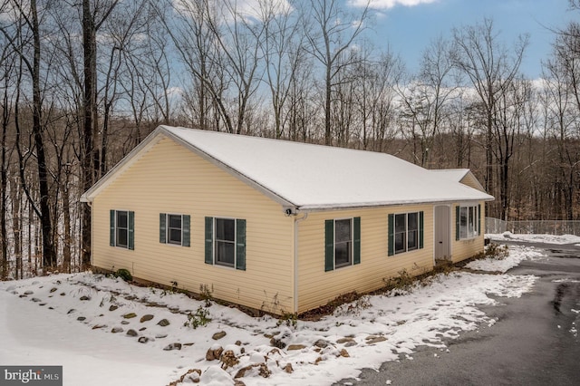 view of snow covered property