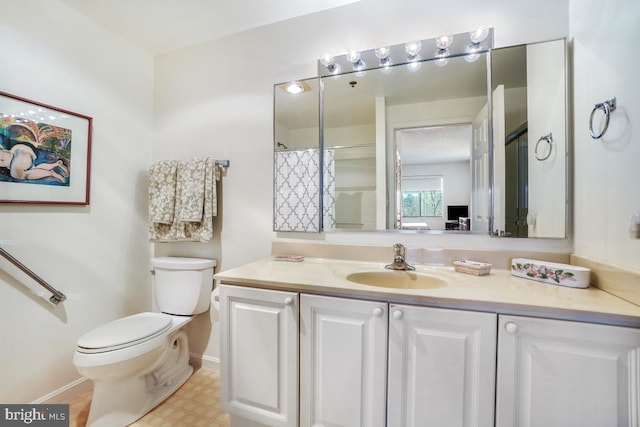 bathroom featuring vanity, walk in shower, and toilet