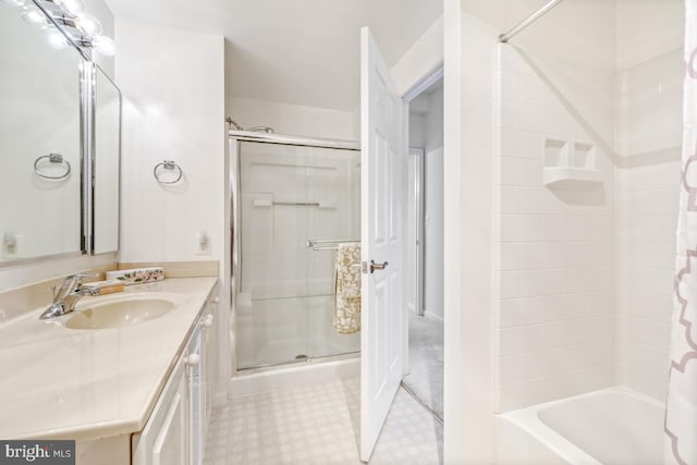 bathroom with vanity and bathtub / shower combination