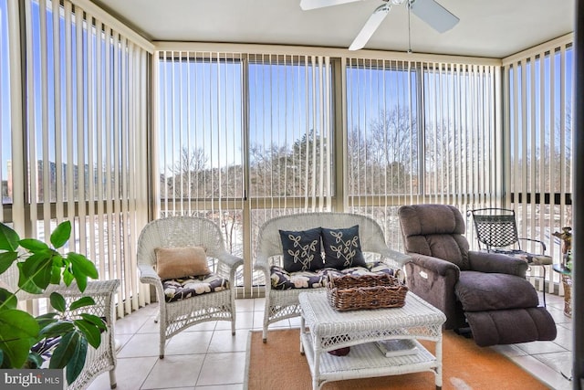 sunroom / solarium featuring ceiling fan and a healthy amount of sunlight