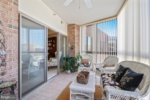 sunroom / solarium with plenty of natural light and ceiling fan