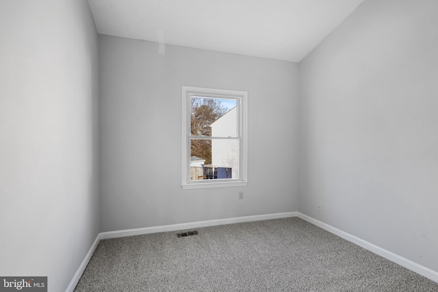 empty room featuring carpet