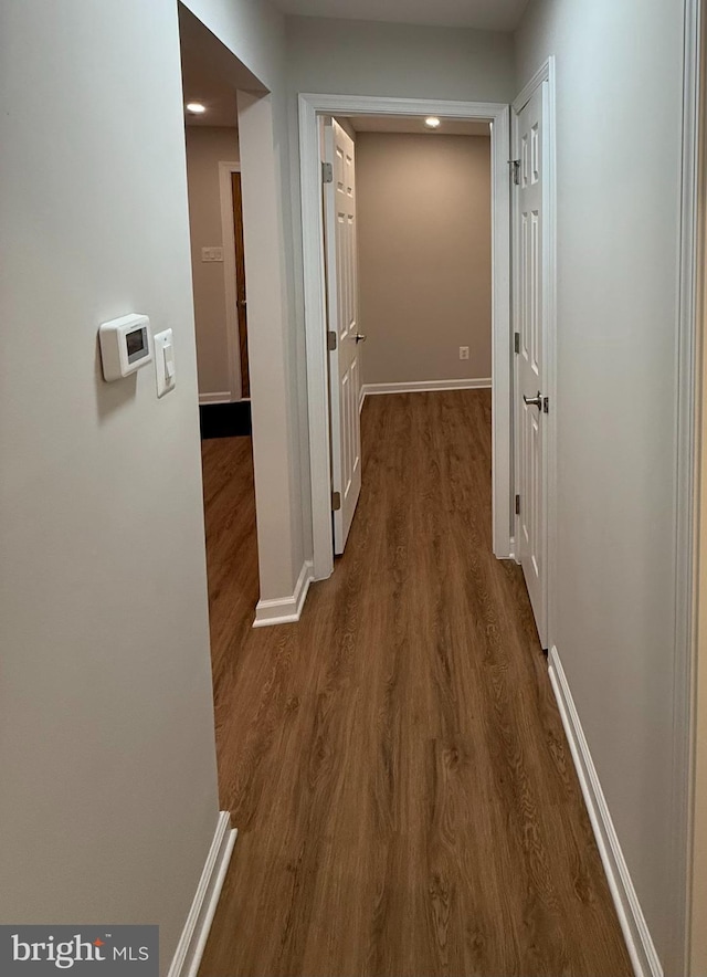 hallway featuring hardwood / wood-style floors