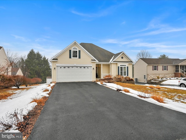 ranch-style home with a garage