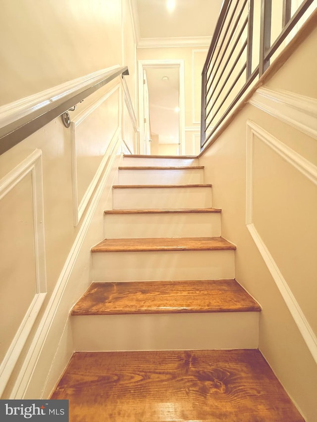 stairway with crown molding