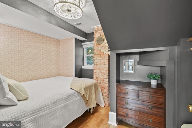 bedroom featuring light wood-type flooring