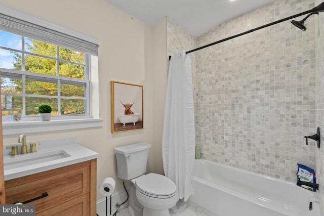 full bathroom featuring vanity, toilet, and shower / bath combo with shower curtain