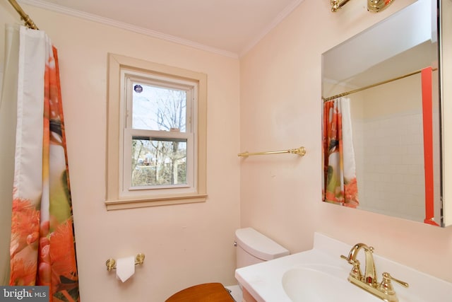 bathroom featuring crown molding, vanity, toilet, and walk in shower