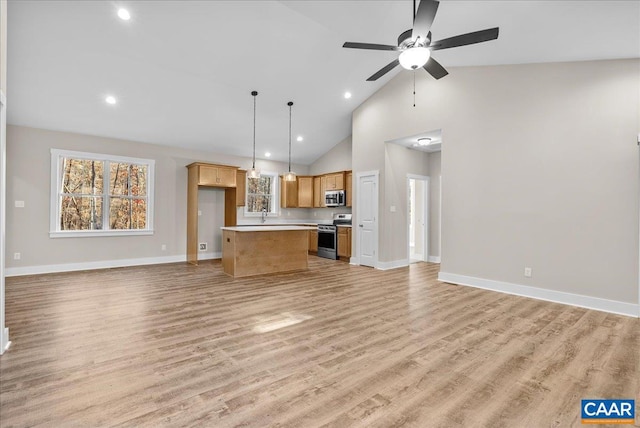 unfurnished living room featuring ceiling fan, light hardwood / wood-style flooring, and high vaulted ceiling