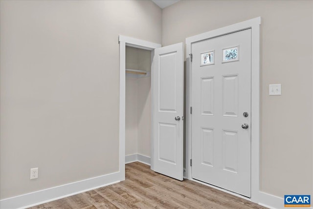 entrance foyer featuring light wood-type flooring