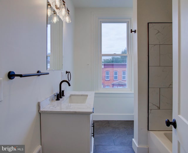 bathroom featuring shower / tub combination, vanity, and a baseboard radiator