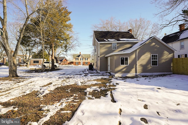 view of snow covered property