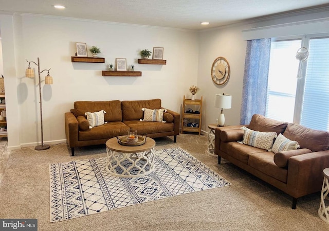 carpeted living room featuring crown molding