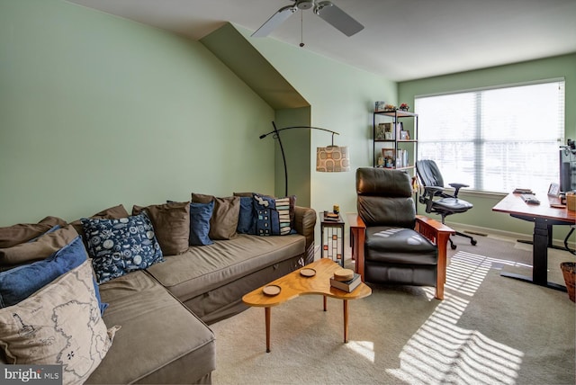 carpeted living room with ceiling fan