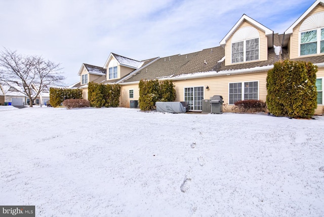 view of snow covered house