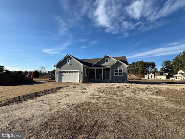 craftsman-style house featuring a garage