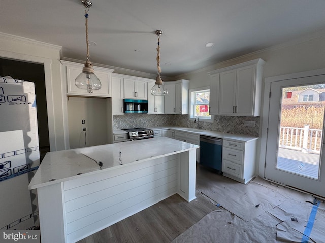 kitchen with sink, stainless steel electric range, dishwasher, white cabinets, and decorative light fixtures