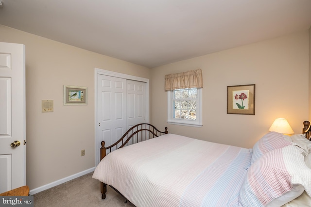 bedroom featuring a closet and carpet