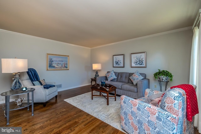 living room with crown molding and dark hardwood / wood-style floors