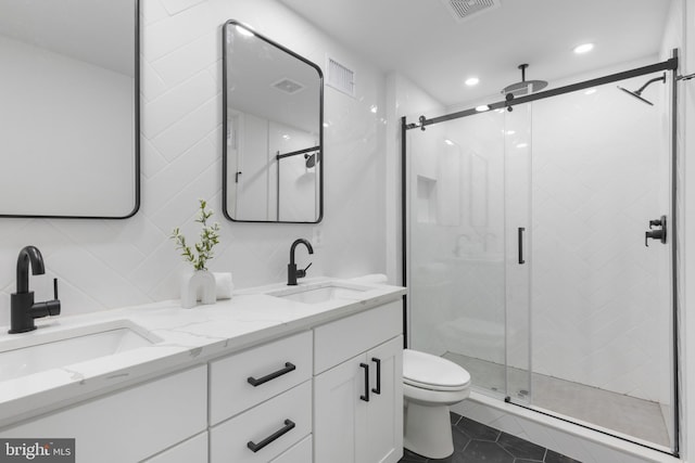 bathroom featuring tile walls, walk in shower, backsplash, and vanity