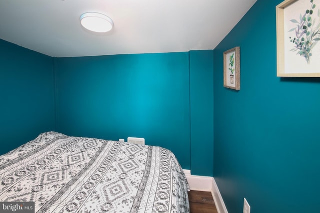 bedroom featuring hardwood / wood-style floors